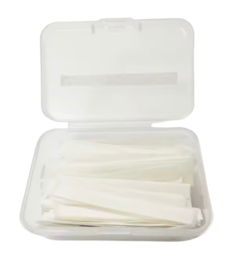 Clear plastic container with white cotton swabs on a white background