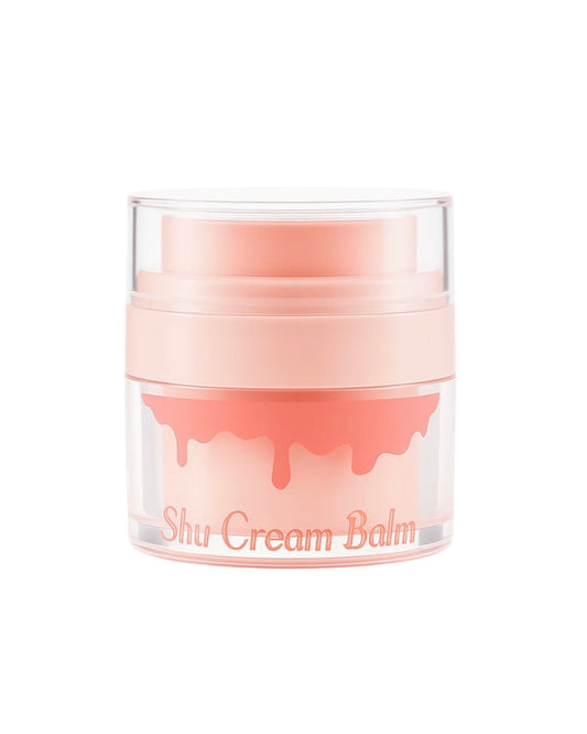 Shu Cream Balm jar with pink cream on a white background